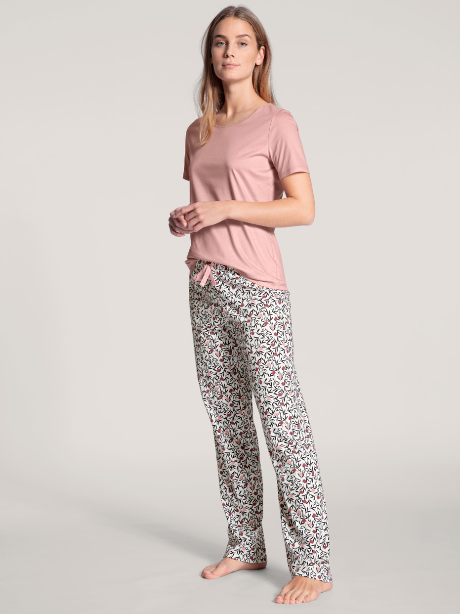 Women model is wearing Pyjama bottom made of 100% Cotton in White, Floral from the Favourites Dreams series by CALIDA, Outfit, Front view