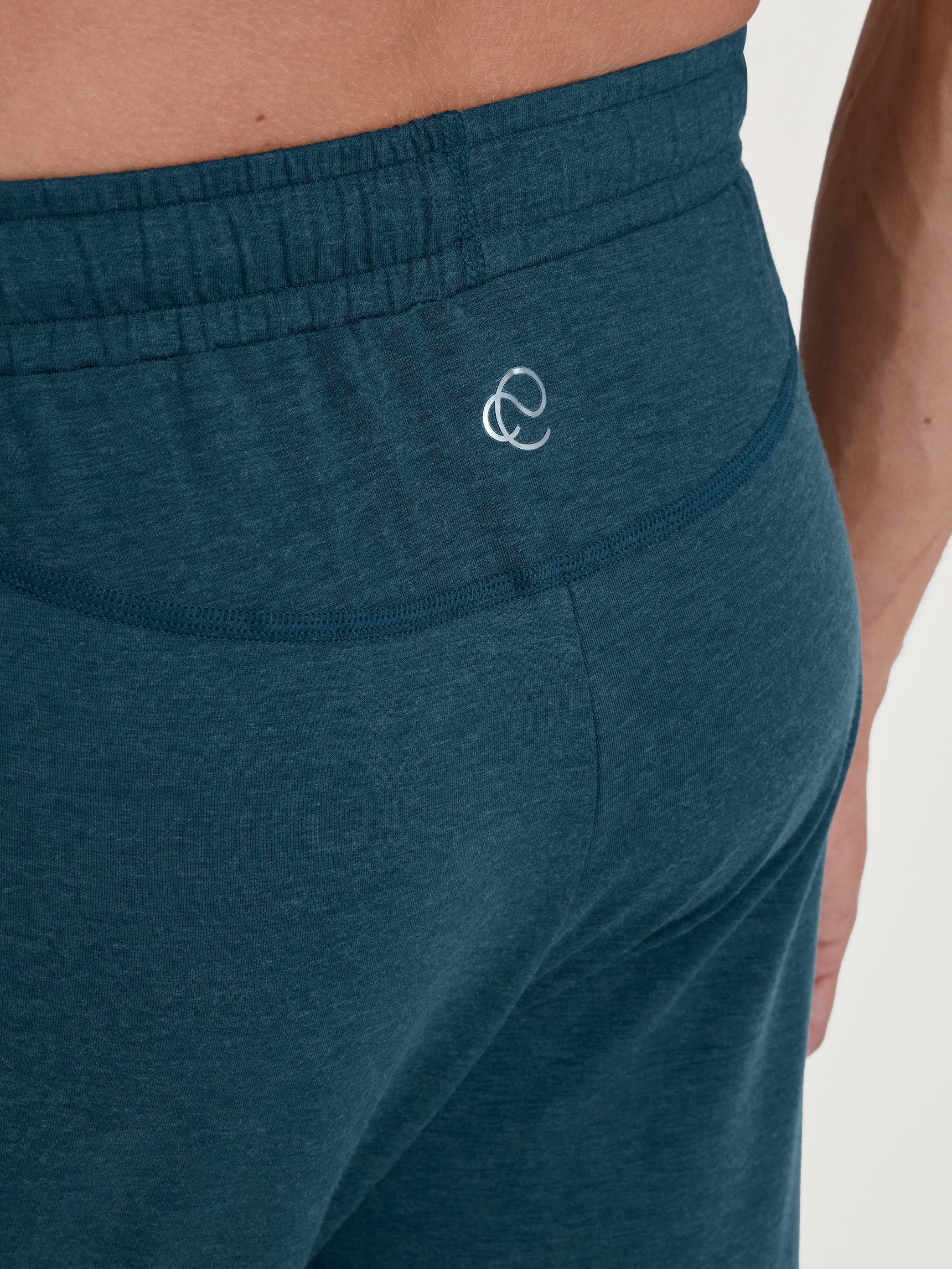 Men model is wearing Pyjama bottom with cuffs made of TENCEL™ in Turquoise, Unicoloured from the DSW Warming series by CALIDA, Detail