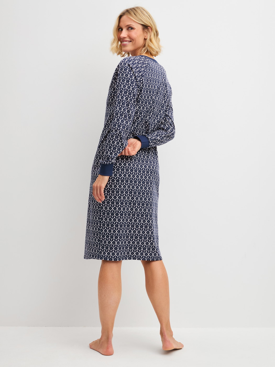 Women model is wearing  made of 100% Cotton in Blue, Patterned from the Midnight Hearts series by CALIDA, Back view