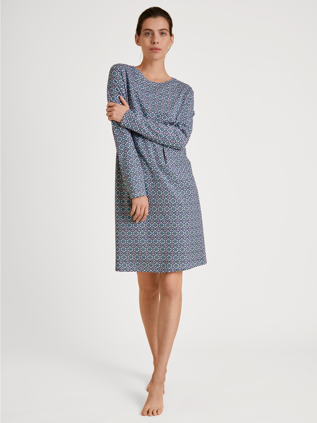 Women model is wearing Nightdress made of 100% Cotton in Turquoise, Motif from the Spring Nights series by CALIDA