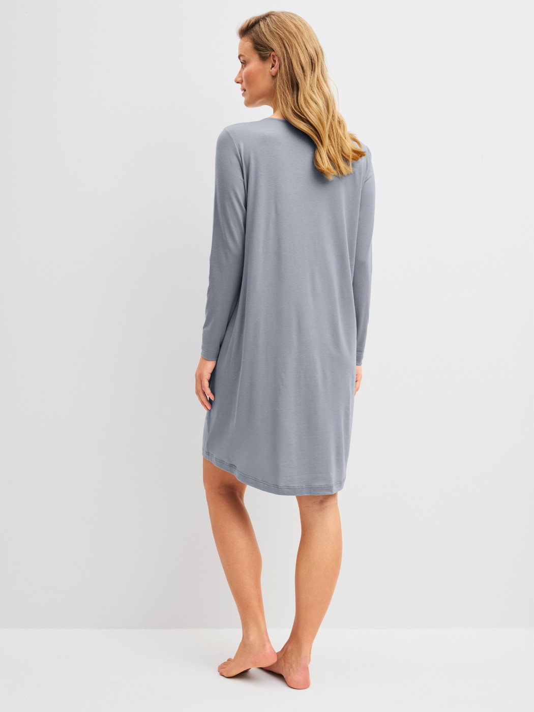 Women model is wearing  made of Lyocell in Grey, Unicoloured from the DSW Warming series by CALIDA, Back view