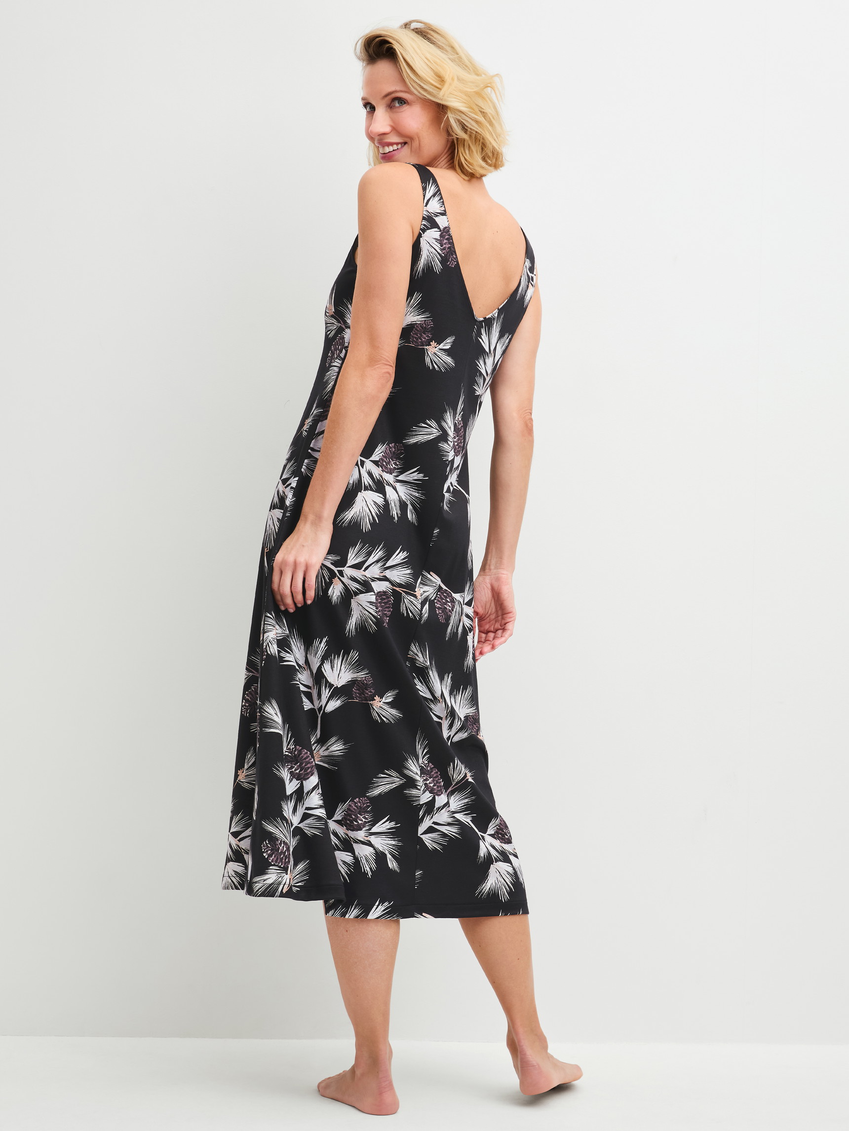 Women model is wearing  made of Modal in Black, Floral from the Glimmer M&M series by CALIDA, Back view