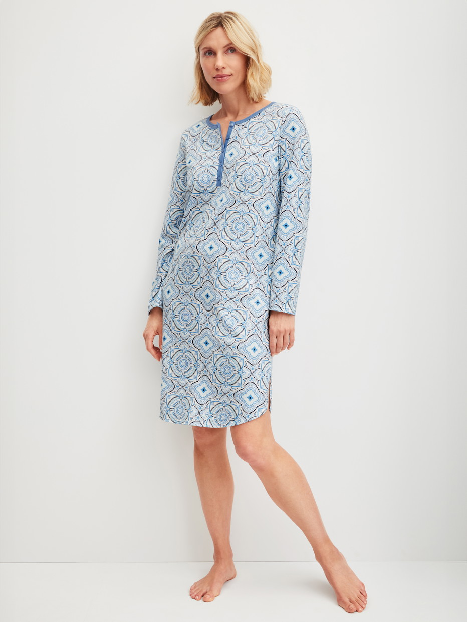 Women model is wearing Long Sleeve Nightdress – 100 cm Length made of 100% Cotton in Blue, Patterned from the Cotton Special series by CALIDA, Front view