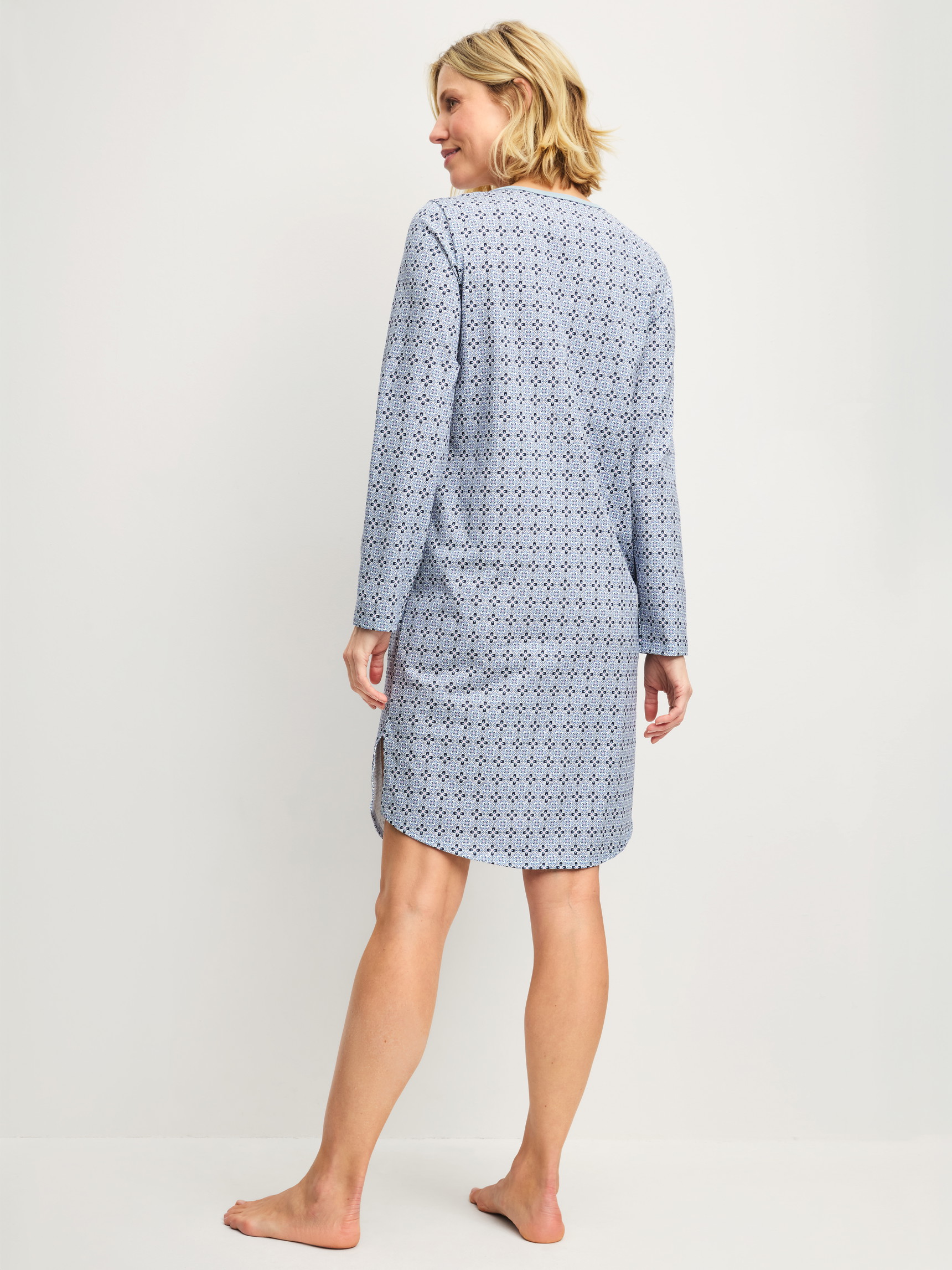 Women model is wearing Long Sleeve Nightdress – 100 cm Length made of 100% Cotton in Grey, Patterned from the Cotton Special series by CALIDA, Back view