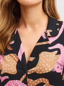 Women model is wearing  made of Modal in Black, Motif from the Sleep Over M&M series by CALIDA, Detail