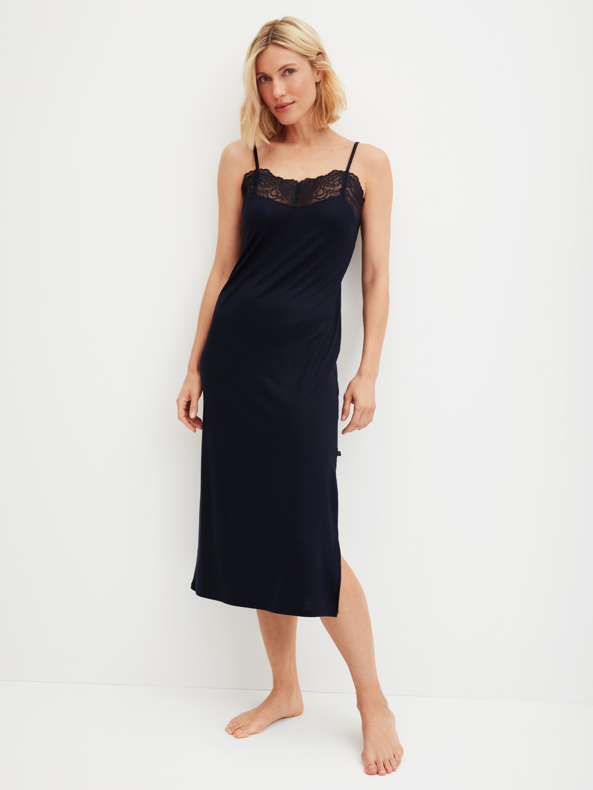 Women model is wearing Nightdress with spaghetti straps made of Modal in Blue, Lace from the Elegant Dreams series by CALIDA, Front view