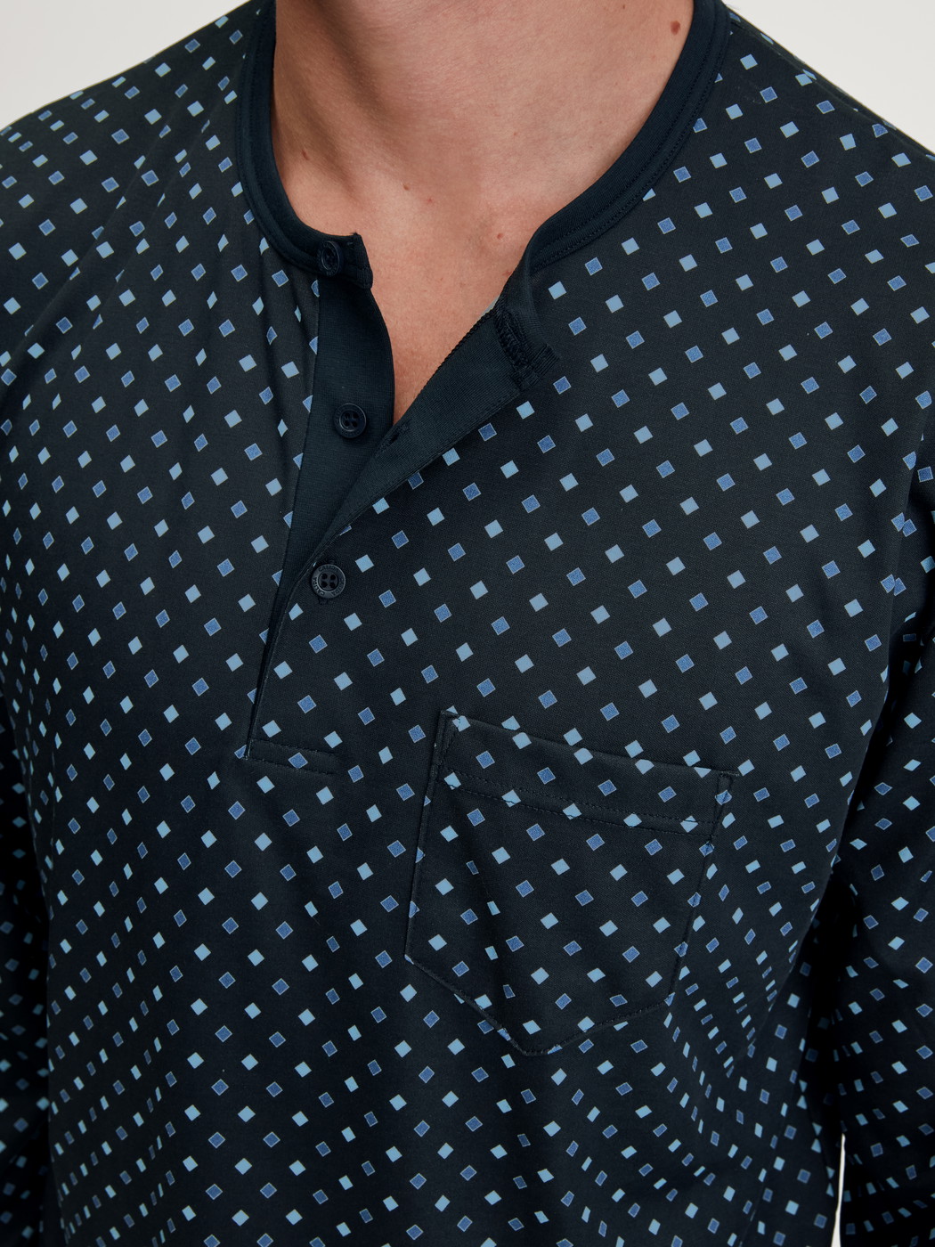 Men model is wearing Nightshirt made of 100% Cotton in Blue, Patterned from the Relax Streamline series by CALIDA, Detail