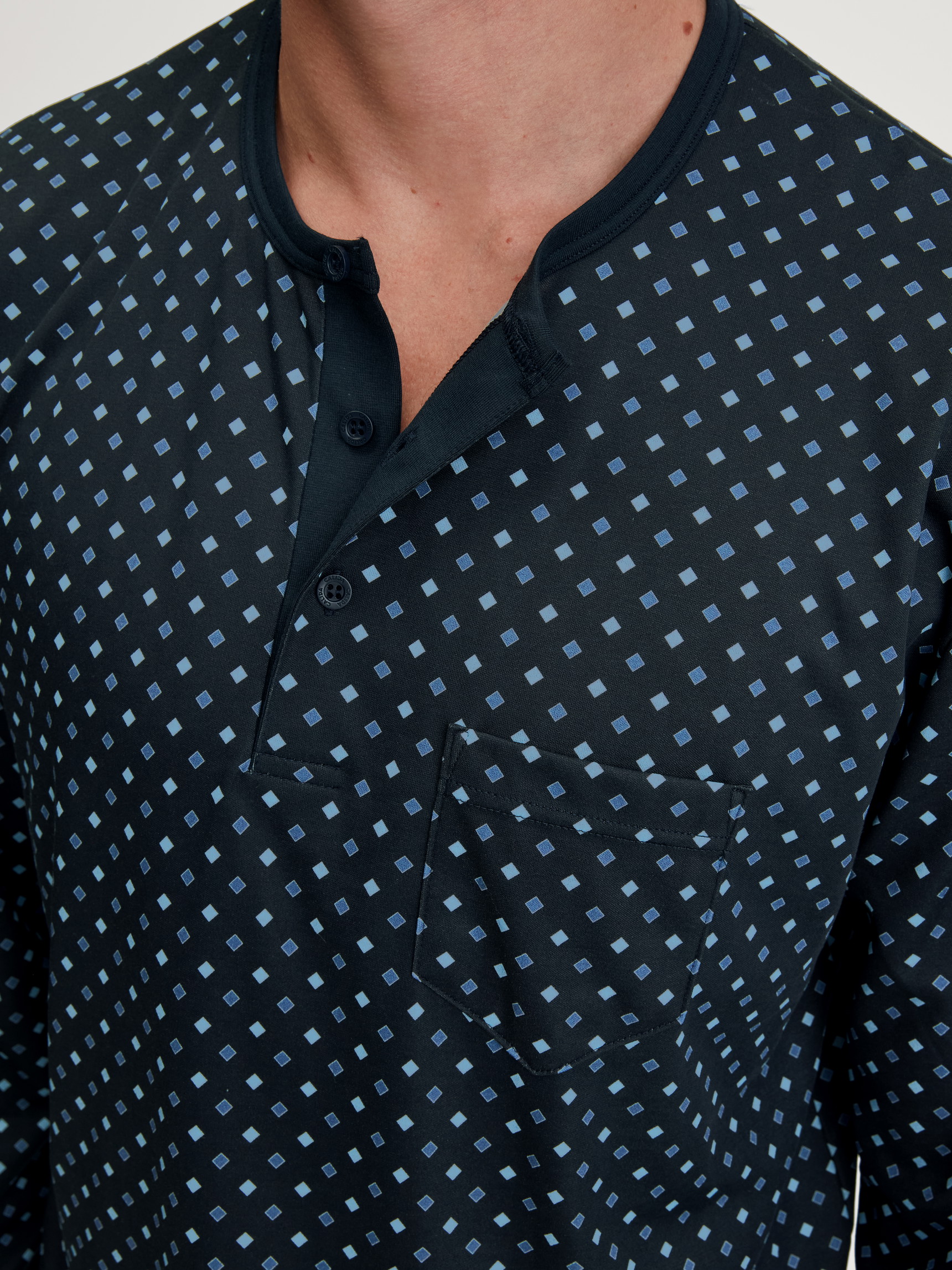 Men model is wearing Nightshirt made of 100% Cotton in Blue, Patterned from the Relax Streamline series by CALIDA, Detail