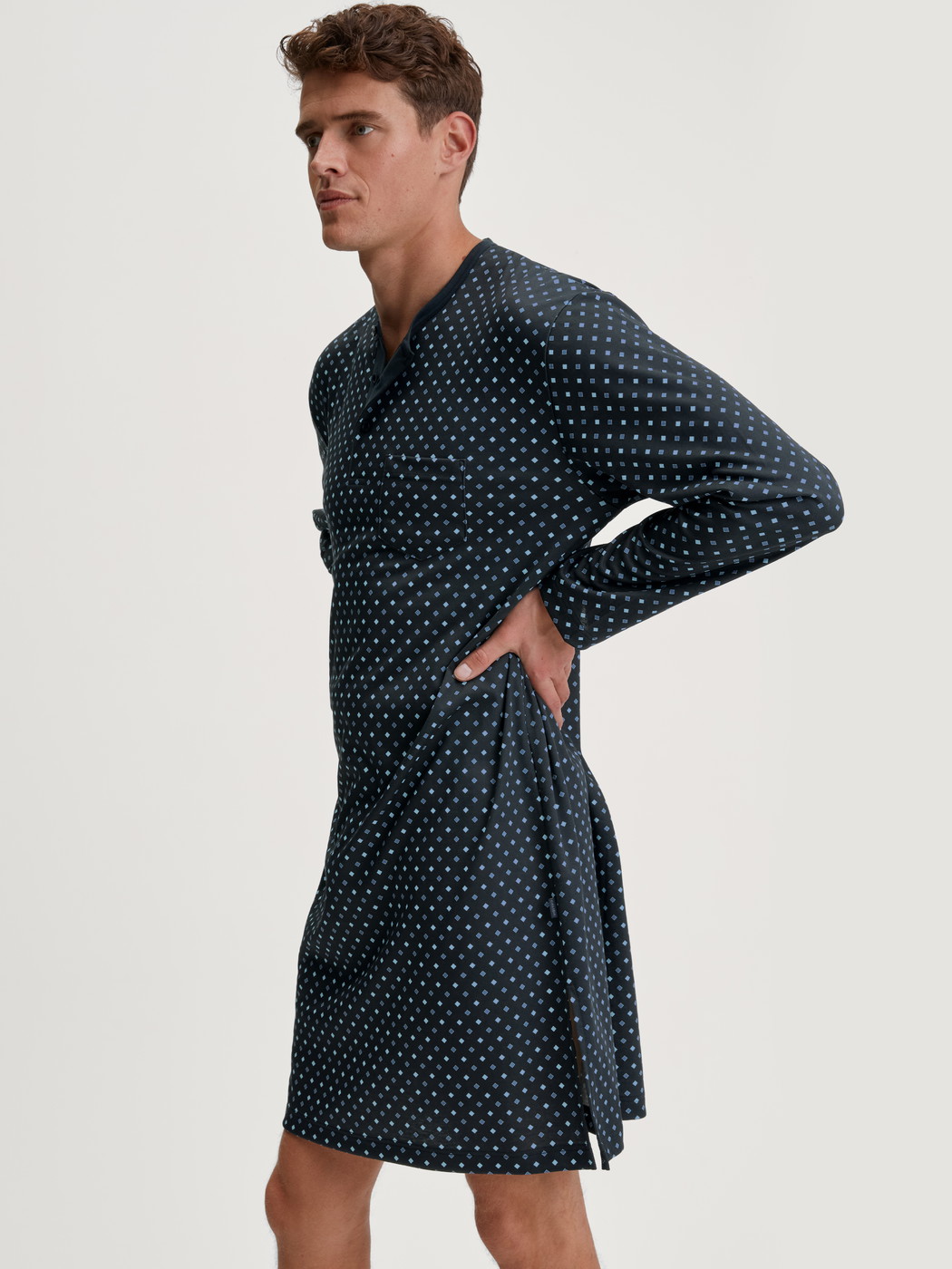 Men model is wearing Nightshirt made of 100% Cotton in Blue, Patterned from the Relax Streamline series by CALIDA, Additional Image