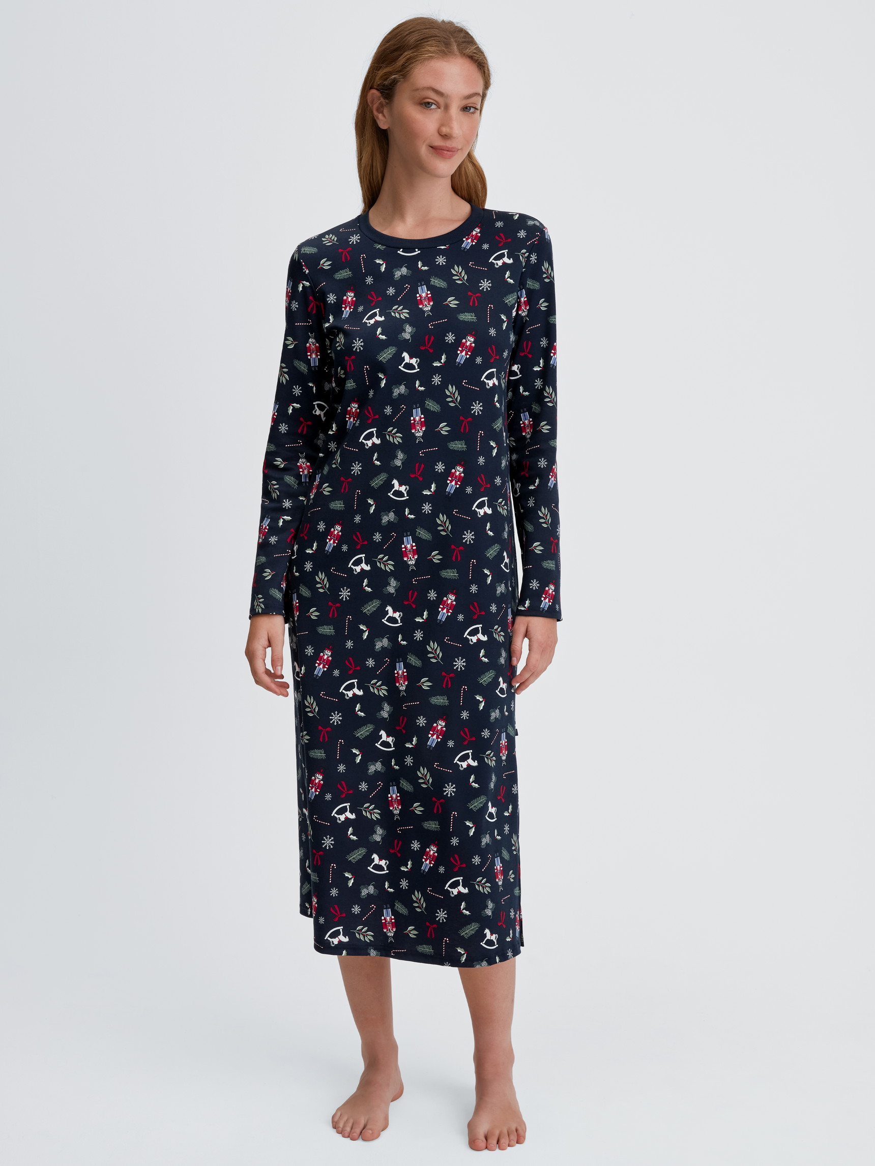 Women model is wearing Long Sleeve Nightdress – 120 cm Length made of 100% Cotton in Blue, Patterned from the Family & Friends series by CALIDA, Front view
