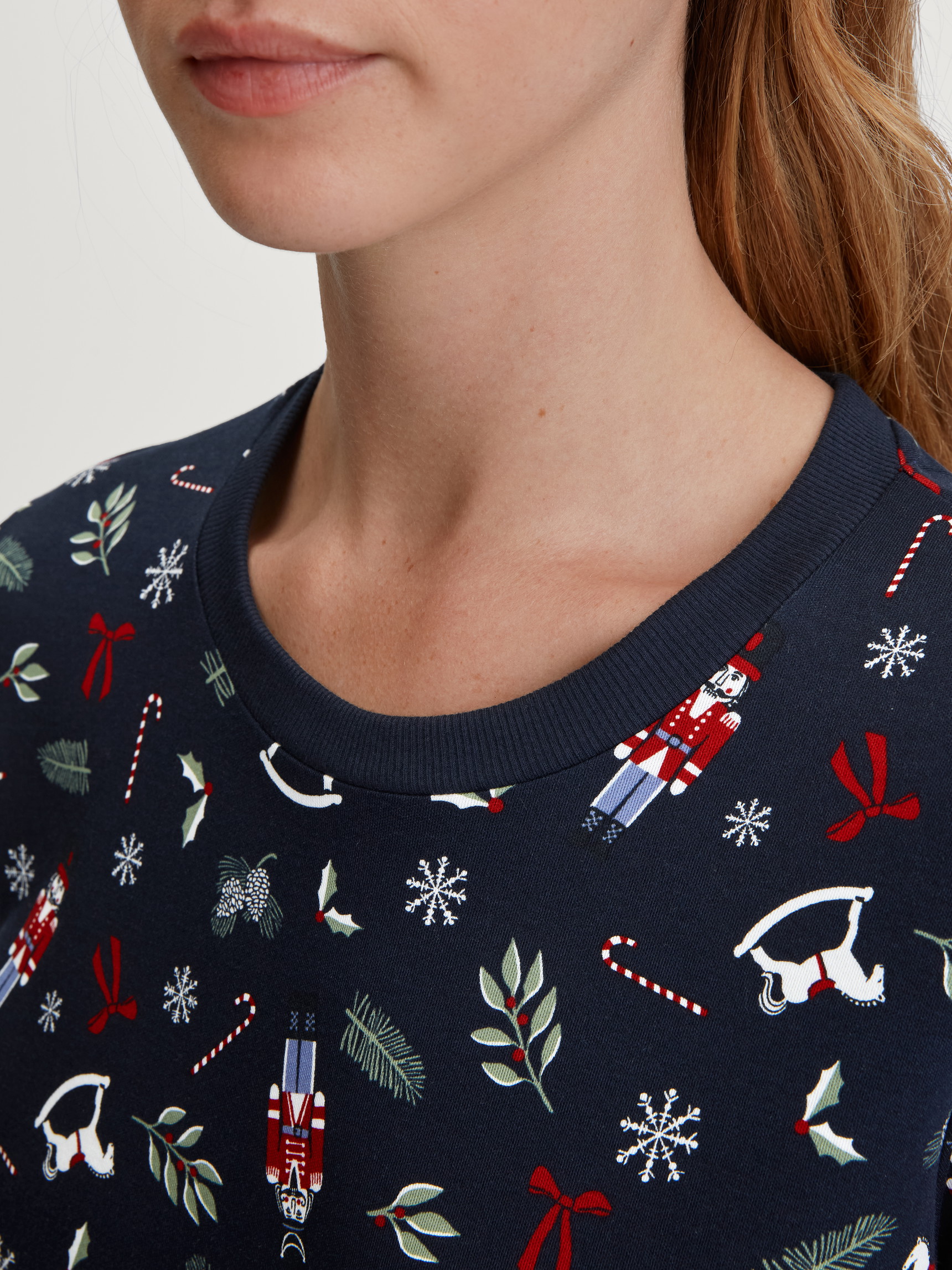 Women model is wearing Long Sleeve Nightdress – 120 cm Length made of 100% Cotton in Blue, Patterned from the Family & Friends series by CALIDA, Detail