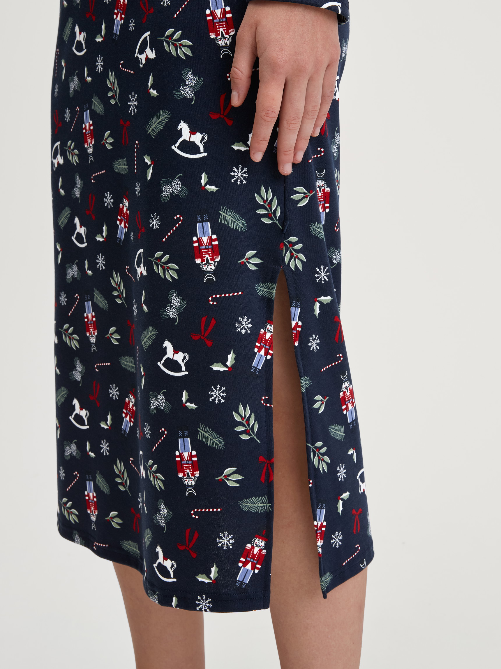 Women model is wearing Long Sleeve Nightdress – 120 cm Length made of 100% Cotton in Blue, Patterned from the Family & Friends series by CALIDA, Detail