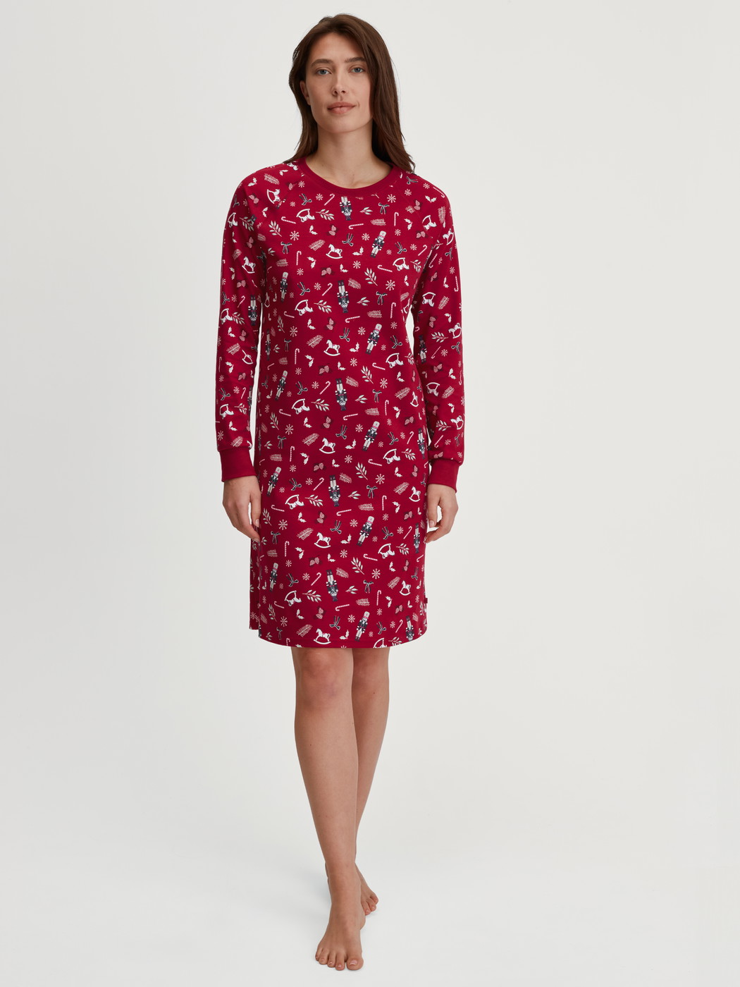 Women model is wearing Long Sleeve Nightdress – 100 cm Length made of 100% Cotton in Red, Patterned from the Family & Friends series by CALIDA, Front view
