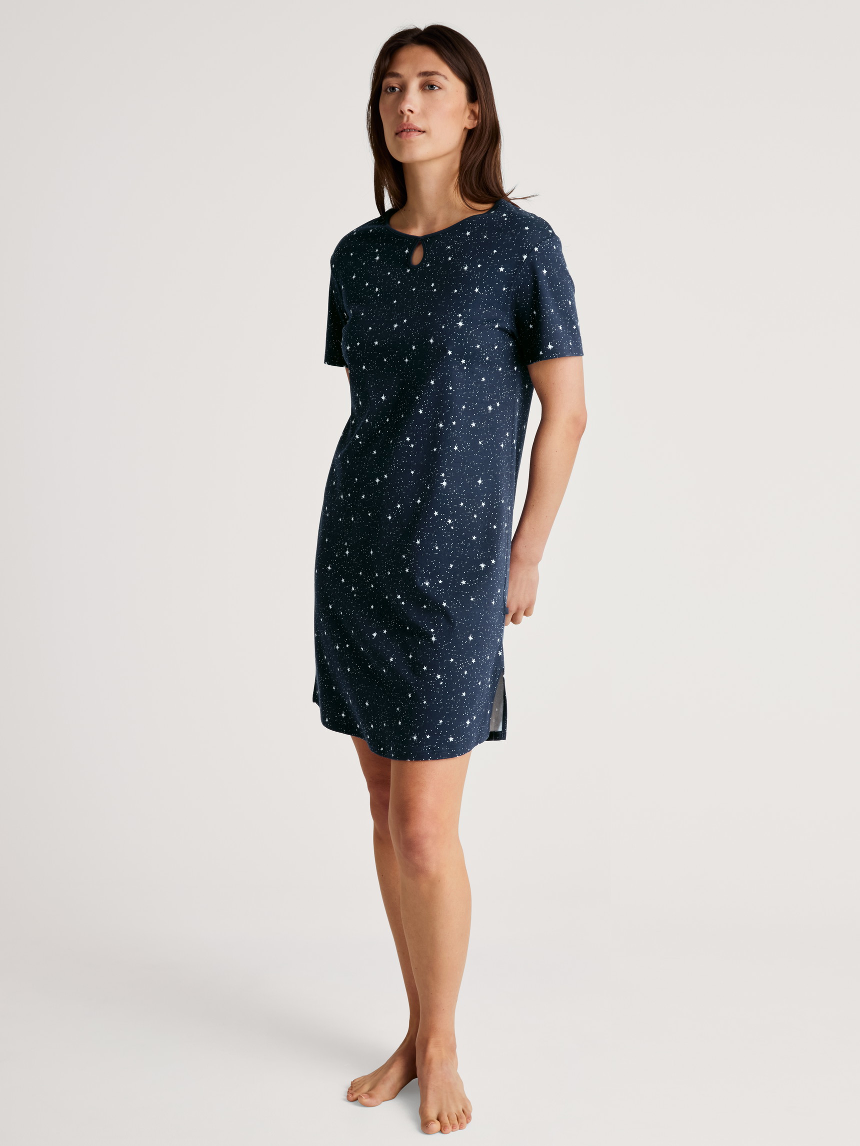 Women model is wearing Nightdress, length 95 cm made of 100% Cotton in Blue, Motif from the Sweet Dreams series by CALIDA, Front view