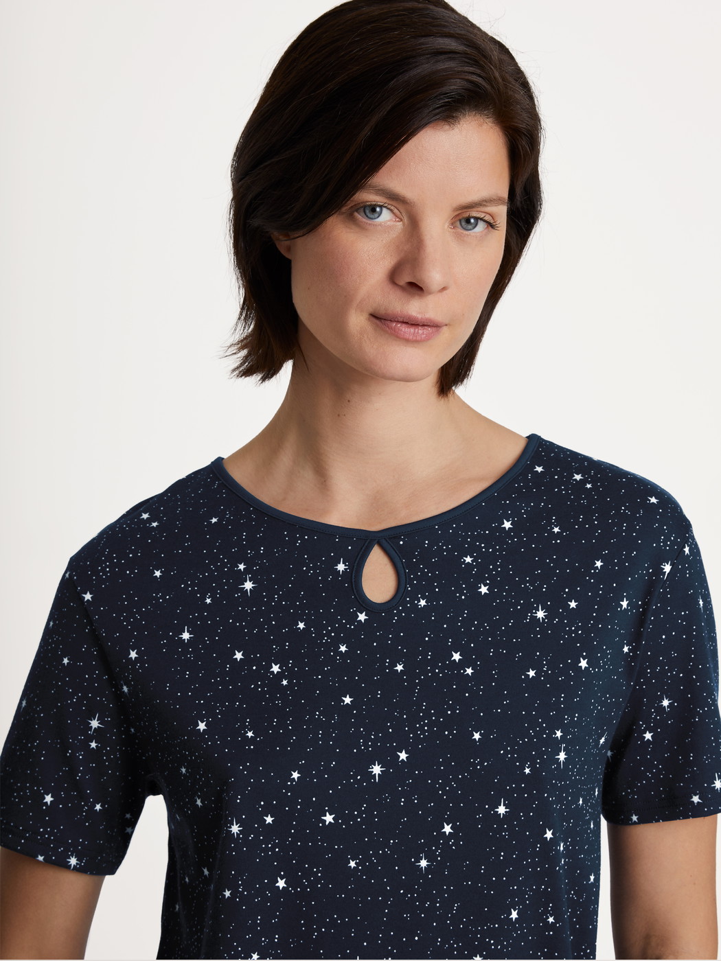 Women model is wearing Nightdress, length 95 cm made of 100% Cotton in Blue, Motif from the Sweet Dreams series by CALIDA, Detail
