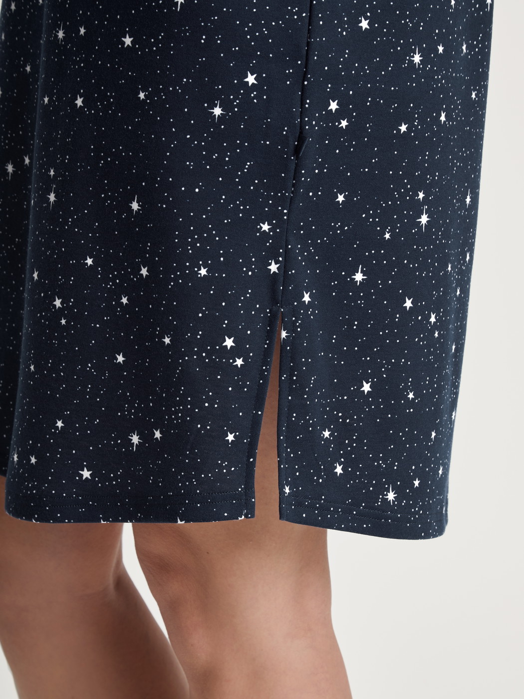 Women model is wearing Nightdress, length 95 cm made of 100% Cotton in Blue, Motif from the Sweet Dreams series by CALIDA, Detail