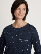 Women model is wearing Long Sleeve Nightdress – 95 cm Length made of 100% Cotton in Blue, Motif from the Sweet Dreams series by CALIDA, Detail