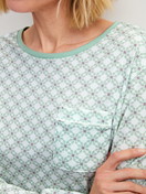 Women model is wearing Long Sleeve Nightdress – 95 cm Length made of 100% Cotton in Turquoise, Patterned from the Sweet Dreams series by CALIDA, Detail