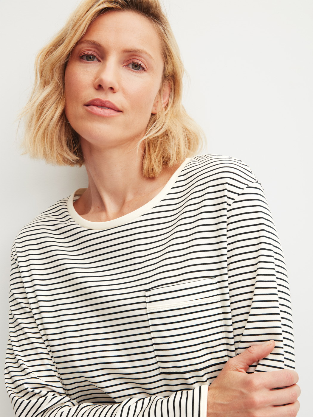 Women model is wearing Long Sleeve Nightdress – 95 cm Length made of 100% Cotton in Beige, Striped from the Sweet Dreams series by CALIDA, Detail