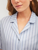 Women model is wearing Short-sleeved nightdress with buttons, length 95 cm made of 100% Cotton in Blue, Striped from the Striped Dreams series by CALIDA, Detail