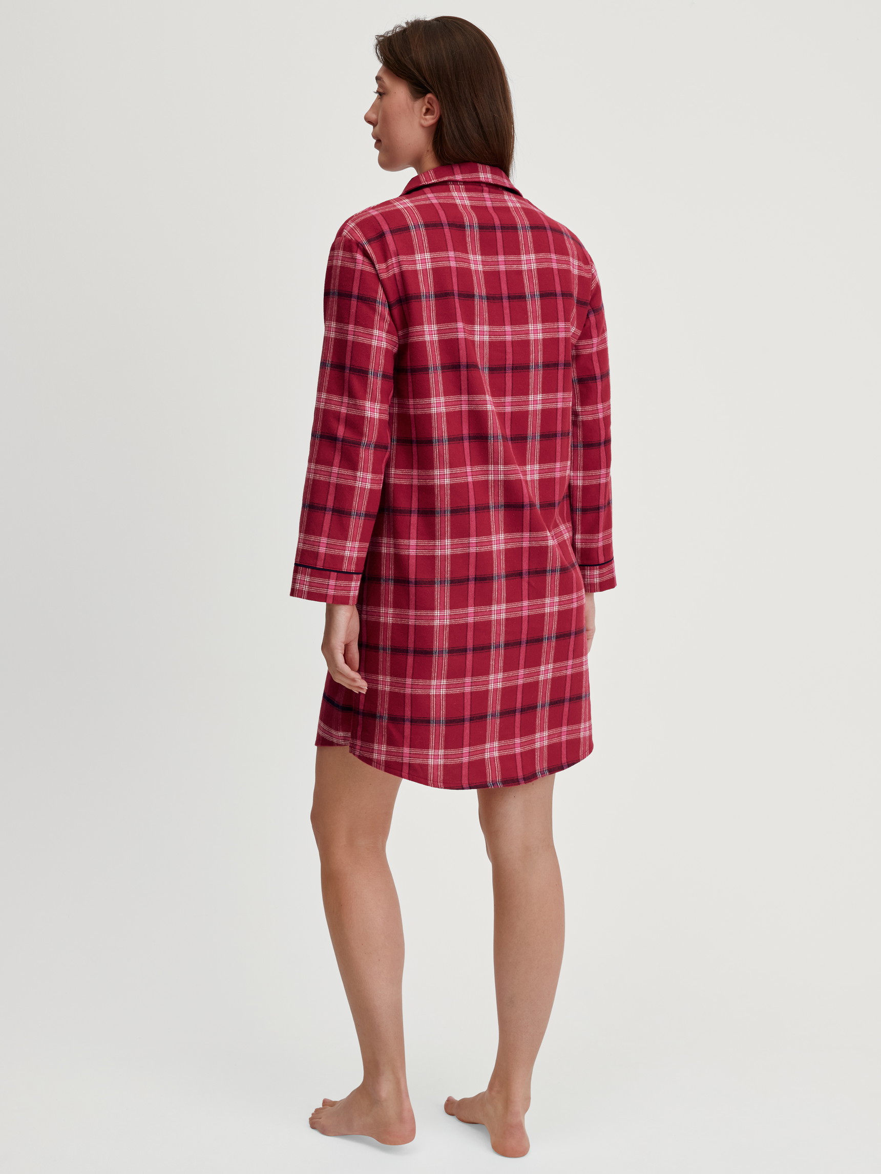 Women model is wearing Flannel nightdress, length 95 cm made of 100% Cotton in Red, Checked from the Holiday Dreams series by CALIDA, Back view