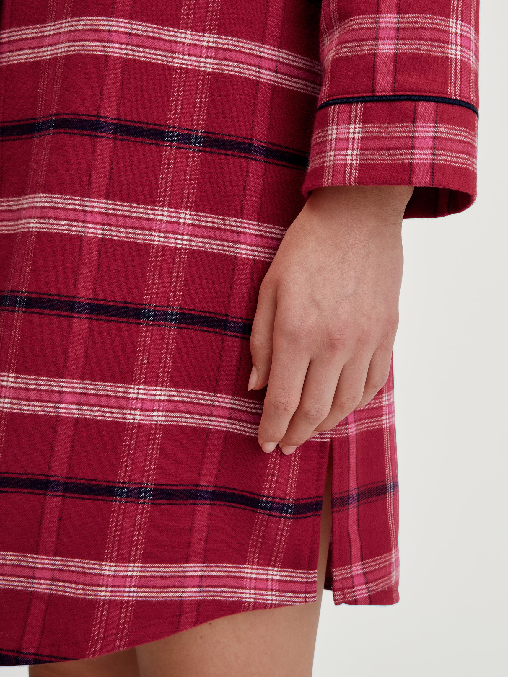 Women model is wearing Flannel nightdress, length 95 cm made of 100% Cotton in Red, Checked from the Holiday Dreams series by CALIDA, Detail