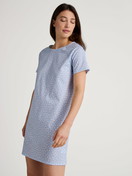 Women model is wearing Sleepshirt, length 90cm made of 100% Cotton in Blue, Patterned from the Favourites Sleep series by CALIDA, Front view