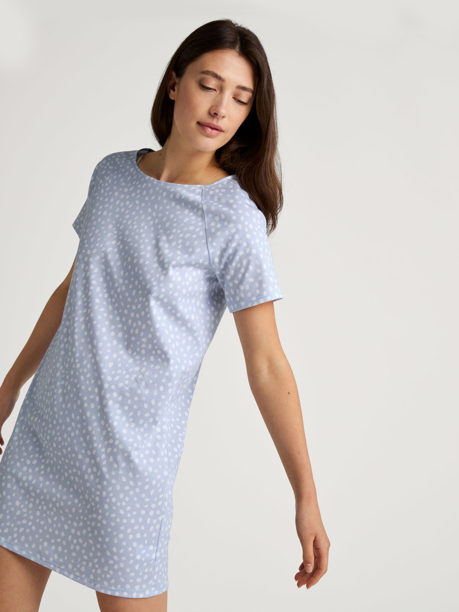 Women model is wearing Sleepshirt, length 90cm made of 100% Cotton in Blue, Patterned from the Favourites Sleep series by CALIDA, Additional Image