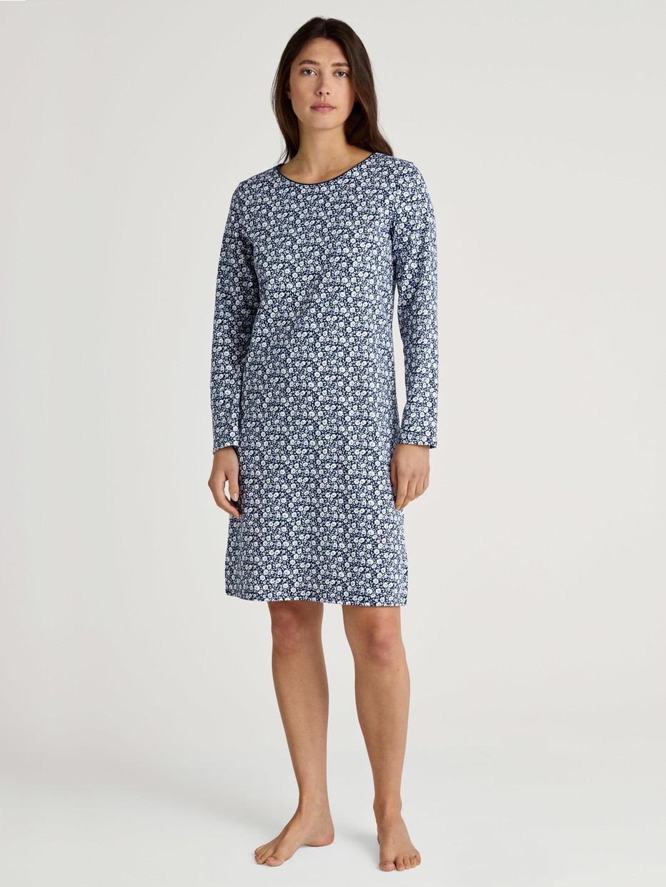 Women model is wearing Long Sleeve Nightdress – 100 cm Length made of 100% Cotton in Blue, Floral from the Favourites Sleep series by CALIDA, Front view