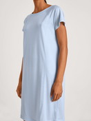 Women model is wearing Sleepshirt made of Lyocell in Blue, Unicoloured from the DSW Cooling series by CALIDA