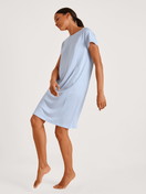 Women model is wearing Sleepshirt made of Lyocell in Blue, Unicoloured from the DSW Cooling series by CALIDA