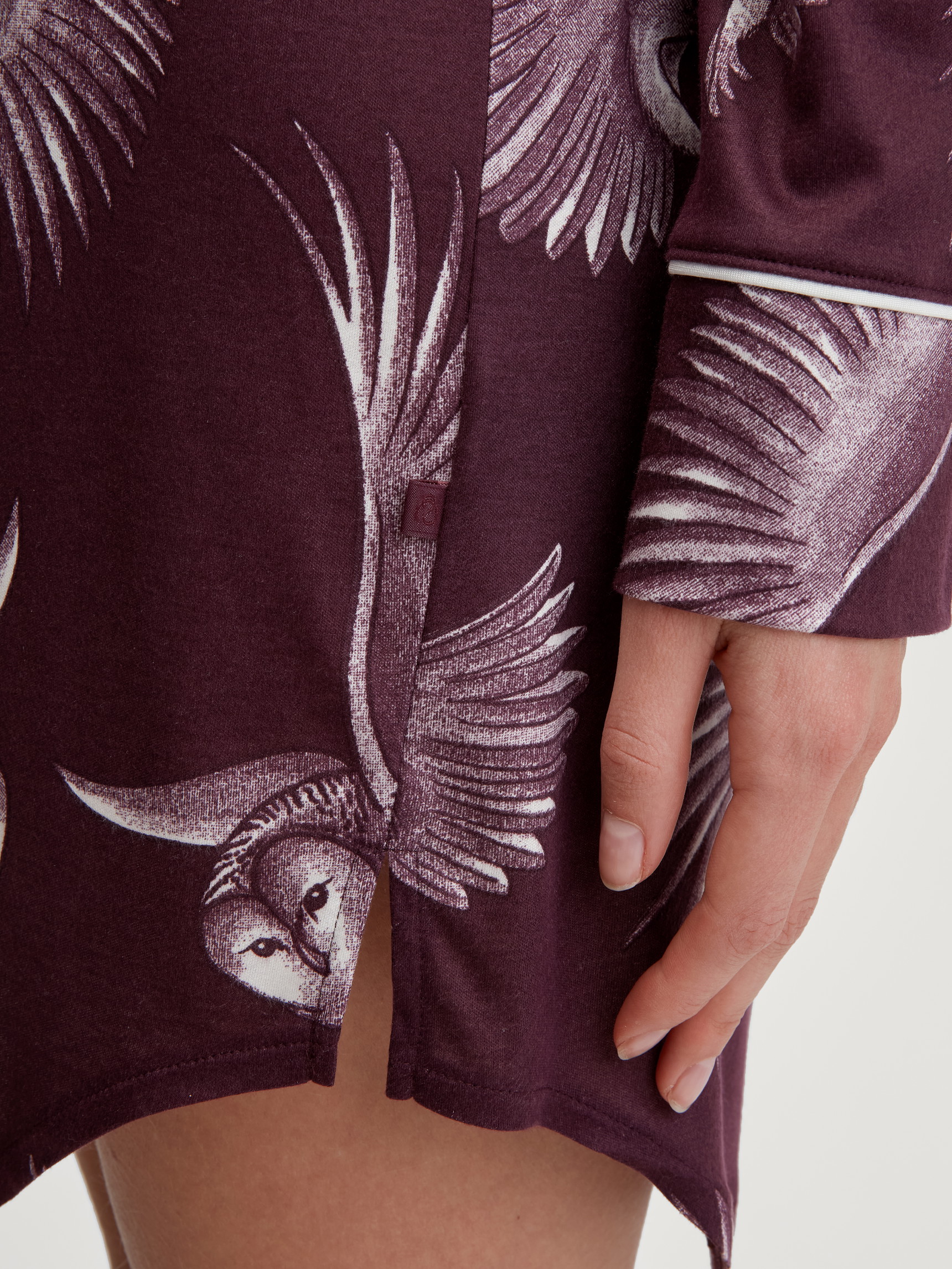 Women model is wearing Long Sleeve Nightdress in TENCEL™ Modal and Silk made of Modal in Red, Floral from the Moonlight Dreams series by CALIDA, Detail