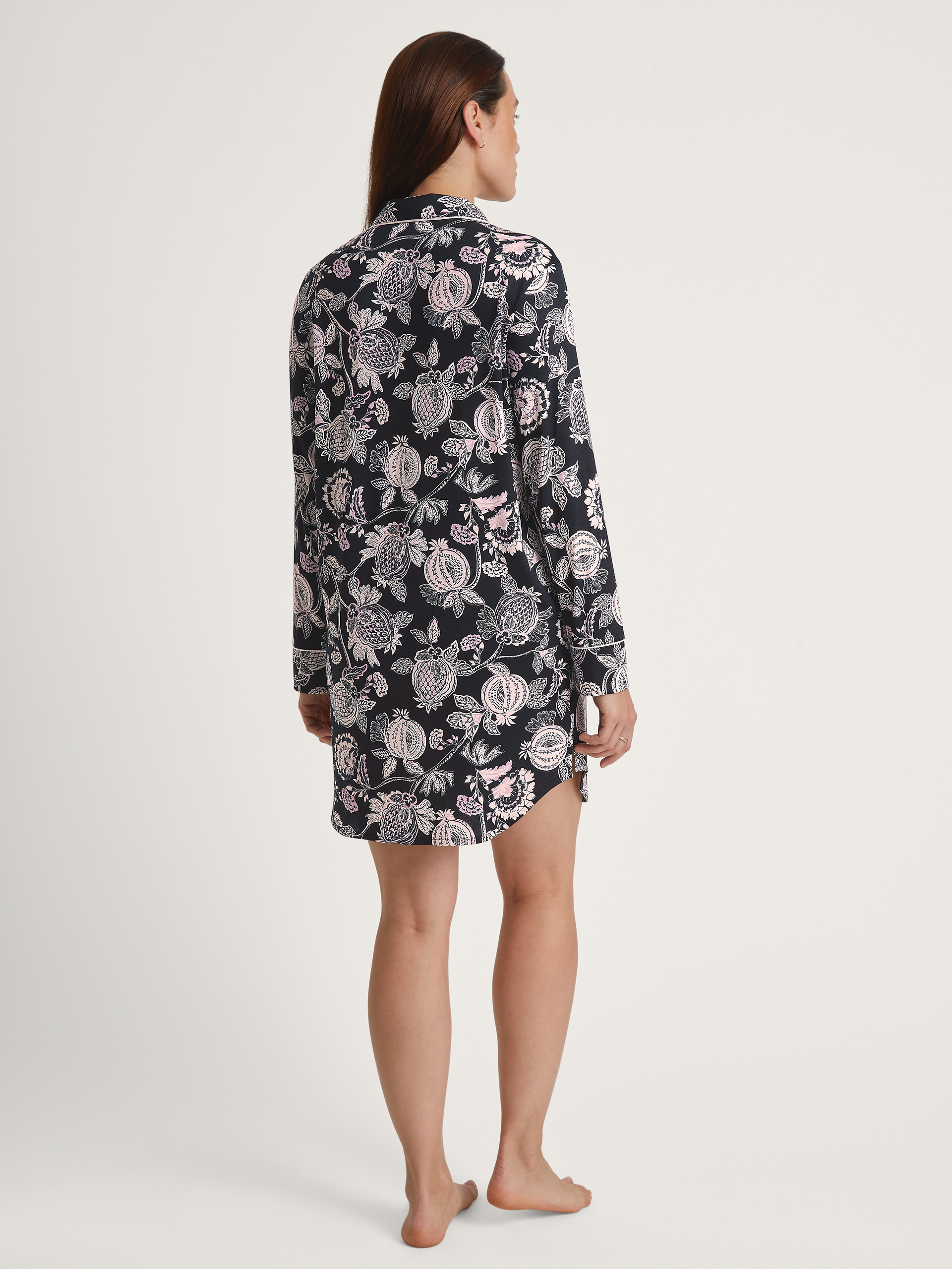 Women model is wearing Long Sleeve Nightdress in TENCEL™ Modal and Silk made of Modal in Black, Floral from the Moonlight Dreams series by CALIDA, Back view