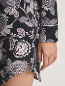 Women model is wearing Long Sleeve Nightdress in TENCEL™ Modal and Silk made of Modal in Black, Floral from the Moonlight Dreams series by CALIDA, Detail