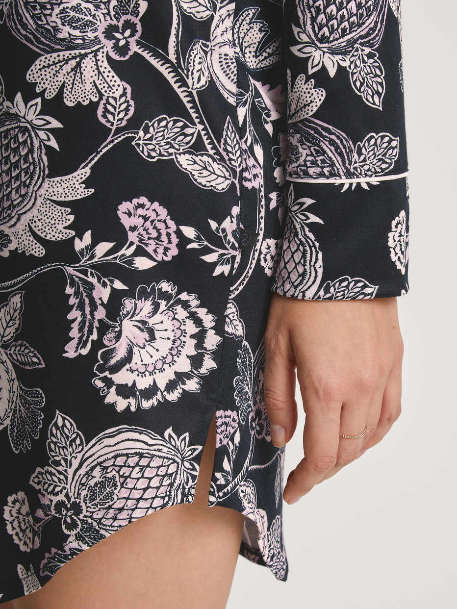 Women model is wearing Long Sleeve Nightdress in TENCEL™ Modal and Silk made of Modal in Black, Floral from the Moonlight Dreams series by CALIDA, Detail