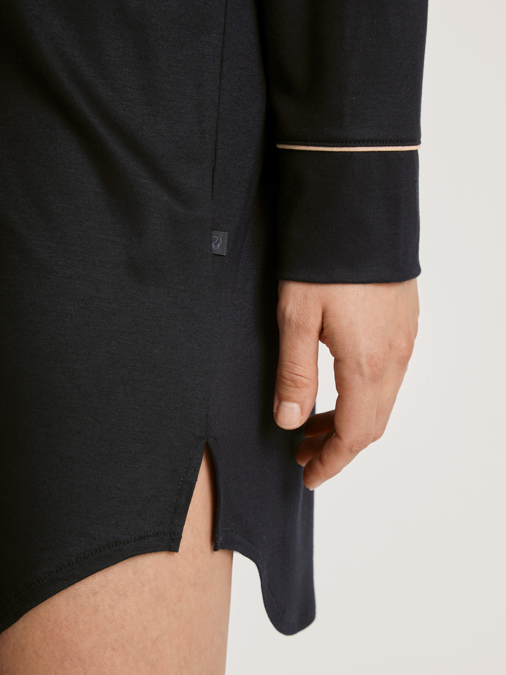Women model is wearing Long Sleeve Nightdress in TENCEL™ Modal and Silk made of Modal in Black, Unicoloured from the Moonlight Dreams series by CALIDA, Detail