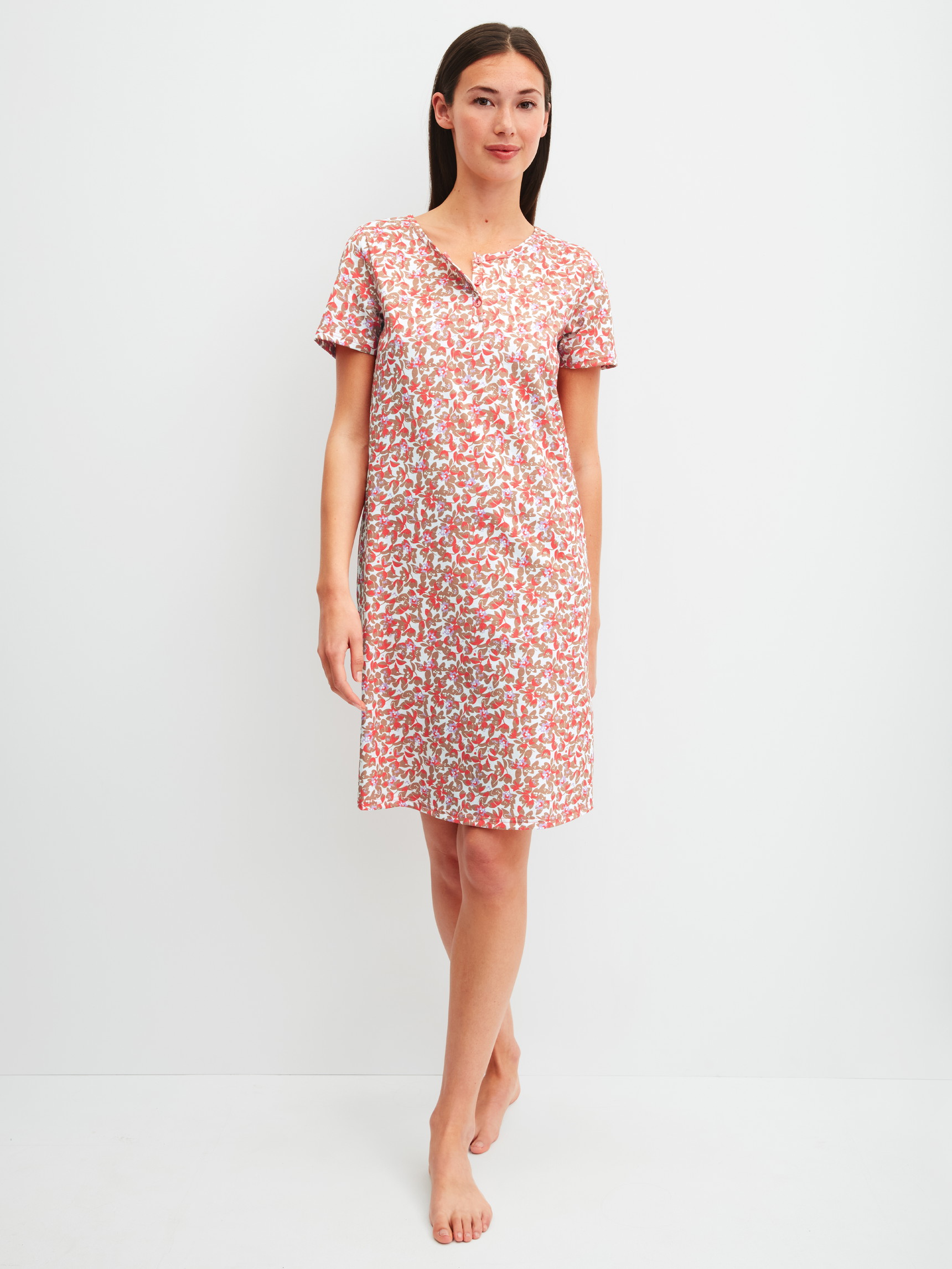 Women model is wearing Short-sleeved nightdress, length 95 cm made of 100% Cotton in Red, Floral from the Flower Nights series by CALIDA, Front view