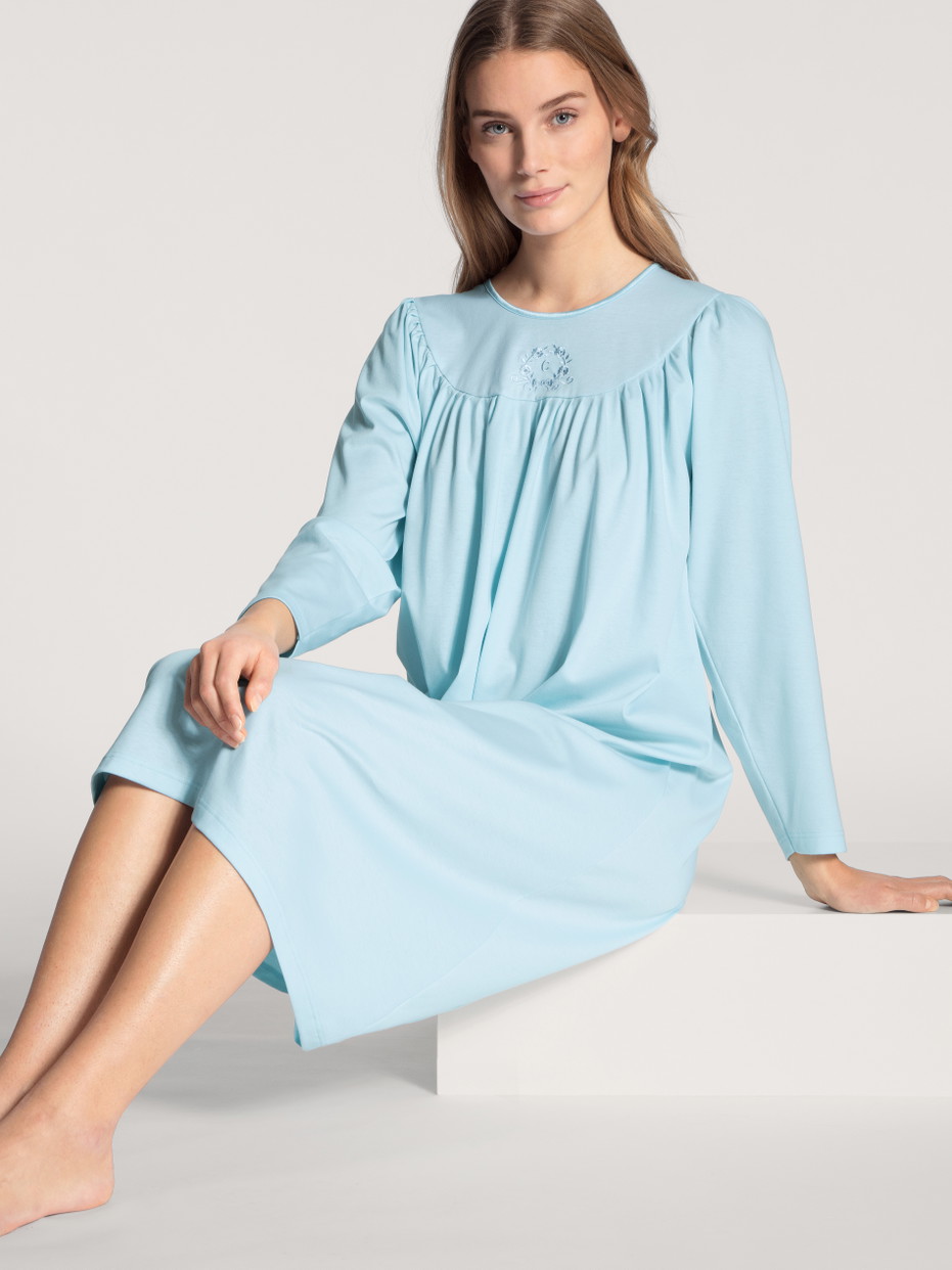 Women model is wearing Nightdress, length 110 cm made of 100% Cotton in Blue, Unicoloured from the Soft Cotton series by CALIDA, Outfit