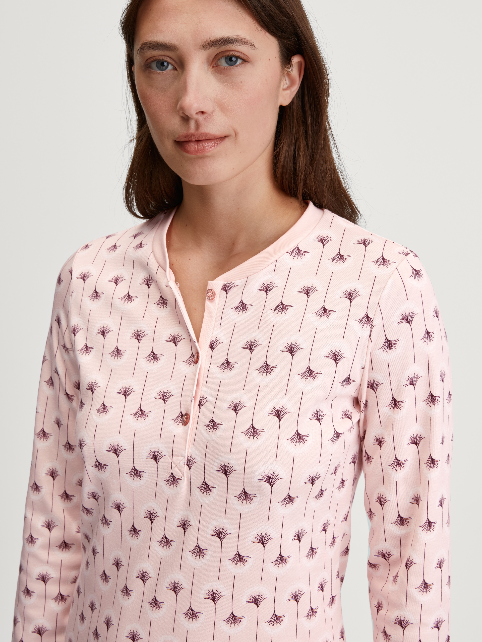 Women model is wearing Long Sleeve Nightdress – 110 cm Length made of 100% Cotton in Pink, Floral from the Midnight Flowers series by CALIDA, Detail