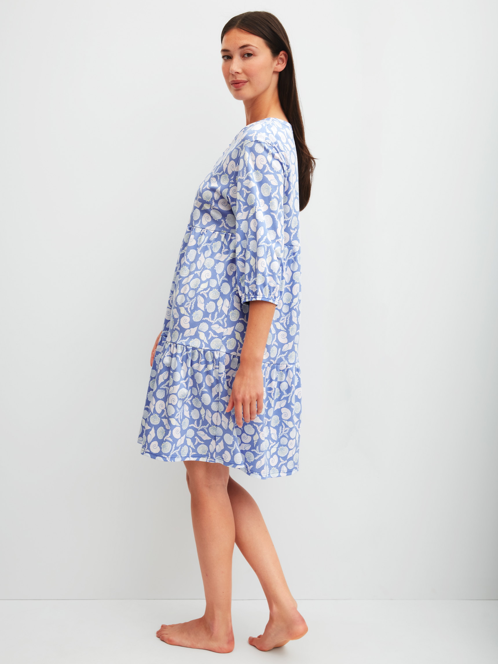 Women model is wearing Nightdress, length 95 cm made of 100% Cotton in Blue, Floral from the Favourites Ocean series by CALIDA, Back view