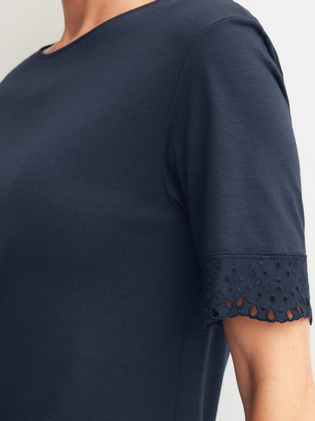 Women model is wearing Short-sleeved nightdress, length 100 cm made of Cotton in Blue, Unicoloured from the Favourites Tiles series by CALIDA, Detail