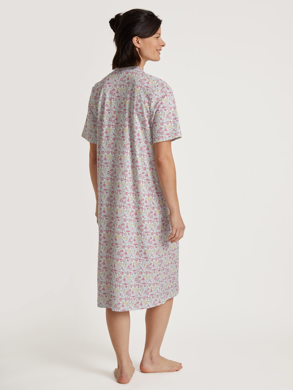 Women model is wearing Nightdress, length 110 cm made of 100% Cotton in Pink, Floral from the Soft Cotton series by CALIDA, Back view