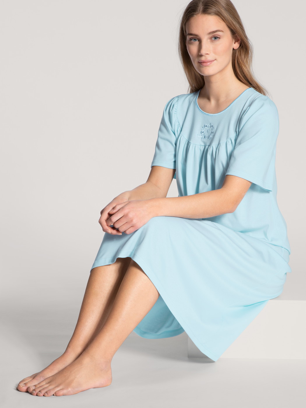 Women model is wearing Nightdress, length 110cm made of 100% Cotton in Blue, Unicoloured from the Soft Cotton series by CALIDA, Outfit