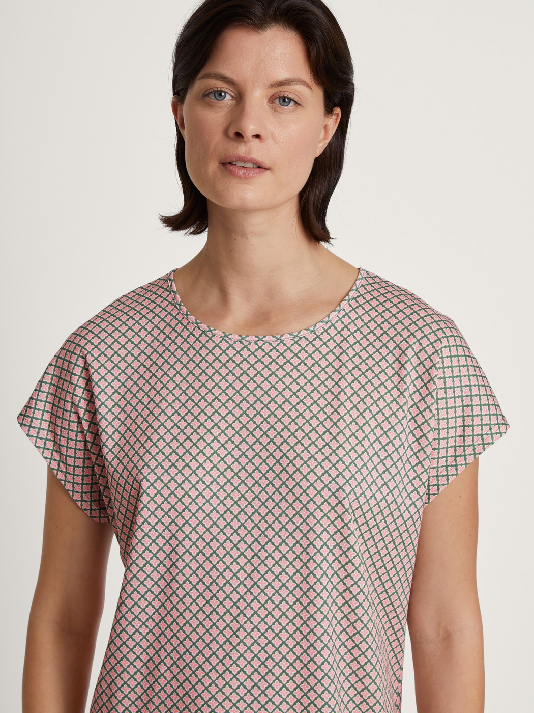 Women model is wearing Sleepshirt, length 90cm made of 100% Cotton in Green, Floral from the Grounded Nights series by CALIDA, Detail