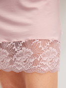 Women model is wearing Short-sleeved nightdress, length 95 cm made of Modal in Pink, Lace from the Elegant Dreams series by CALIDA, Detail