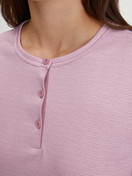 Women model is wearing Sleepshirt, length 90cm made of 100% Cotton in Pink, Striped from the Striped Dreams series by CALIDA, Detail