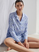 Women model is wearing Nightshirt, length 95 cm made of 100% Cotton in Blue, Floral from the Orient Dreams series by CALIDA, Front view