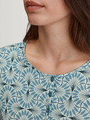 Women model is wearing Long Sleeve Nightdress – 100 cm Length made of 100% Cotton in Blue, Patterned from the Ornament Nights series by CALIDA, Detail