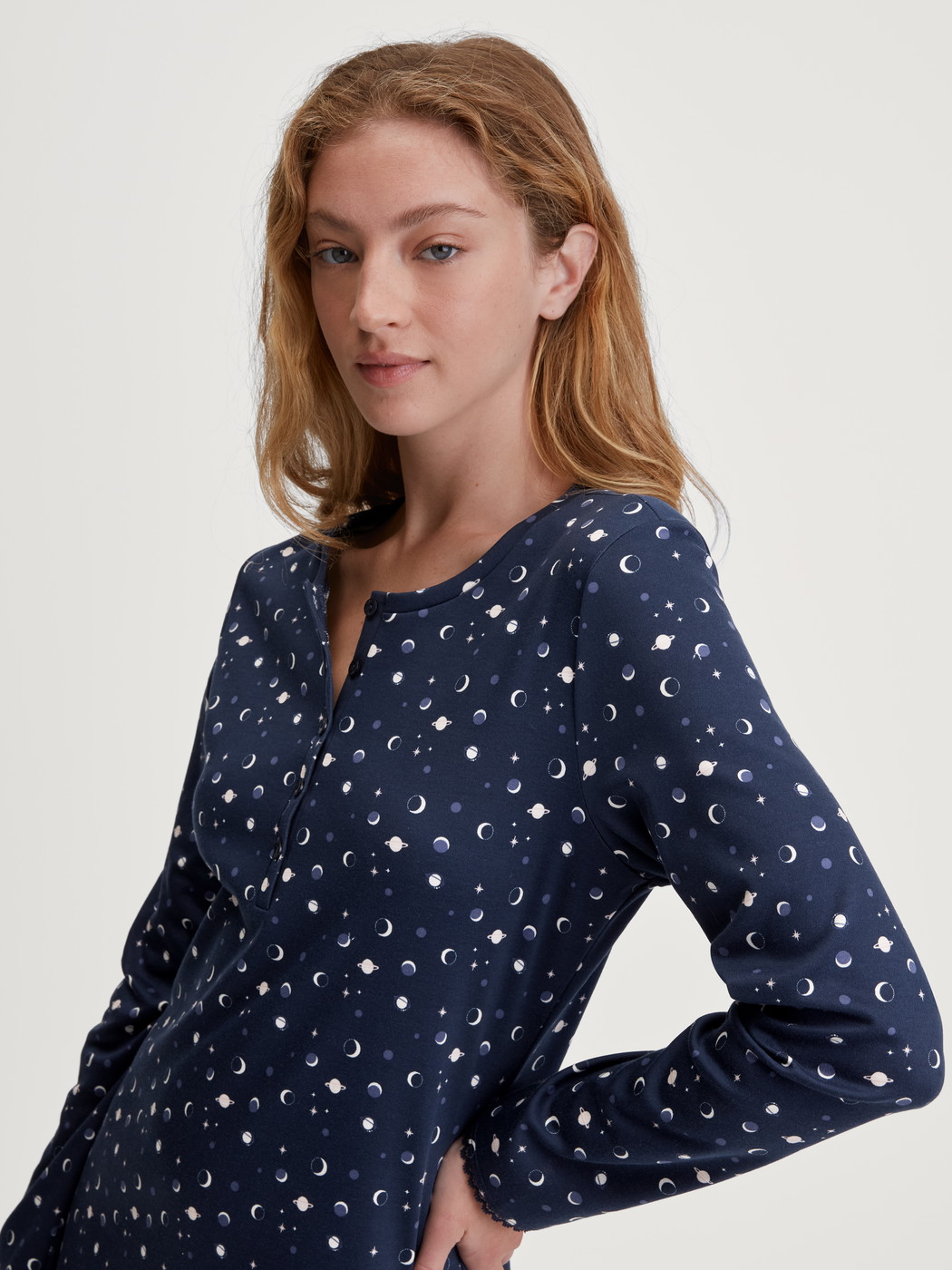 Women model is wearing Long Sleeve Nightdress – 110 cm Length made of 100% Cotton in Blue, Patterned from the Midnight Dreams series by CALIDA, Additional Image