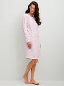 Women model is wearing Long-sleeve nightdress, length 100 cm made of 100% Cotton in Purple, Patterned from the Blooming Nights series by CALIDA, Front view